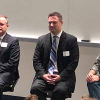Three speakers on a panel at the Cover Letter and Resume Roundtable Event
